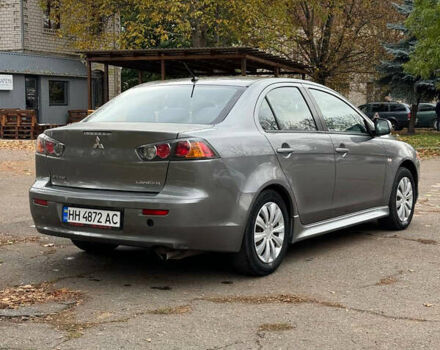 Серый Мицубиси Лансер, объемом двигателя 2 л и пробегом 170 тыс. км за 7400 $, фото 14 на Automoto.ua