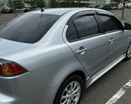 Сірий Міцубісі Lancer, об'ємом двигуна 1.6 л та пробігом 32 тис. км за 8500 $, фото 10 на Automoto.ua