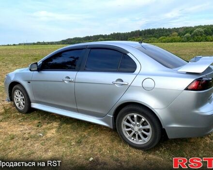Серый Мицубиси Лансер, объемом двигателя 1.6 л и пробегом 170 тыс. км за 8300 $, фото 5 на Automoto.ua