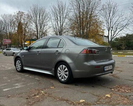 Серый Мицубиси Лансер, объемом двигателя 2 л и пробегом 170 тыс. км за 7400 $, фото 3 на Automoto.ua