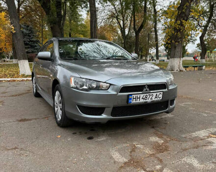 Серый Мицубиси Лансер, объемом двигателя 2 л и пробегом 170 тыс. км за 7400 $, фото 8 на Automoto.ua