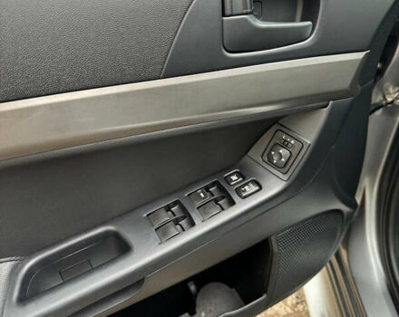 Серый Мицубиси Лансер, объемом двигателя 2 л и пробегом 170 тыс. км за 7400 $, фото 19 на Automoto.ua