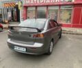 Серый Мицубиси Лансер, объемом двигателя 2 л и пробегом 170 тыс. км за 7198 $, фото 1 на Automoto.ua