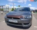Серый Мицубиси Лансер, объемом двигателя 2 л и пробегом 201 тыс. км за 7400 $, фото 1 на Automoto.ua