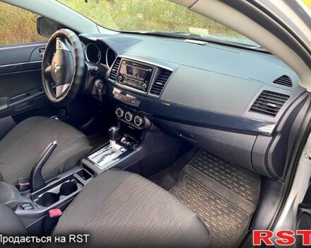 Серый Мицубиси Лансер, объемом двигателя 1.6 л и пробегом 170 тыс. км за 8300 $, фото 11 на Automoto.ua