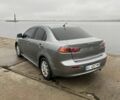 Сірий Міцубісі Lancer, об'ємом двигуна 1.6 л та пробігом 200 тис. км за 6900 $, фото 9 на Automoto.ua