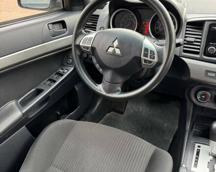 Серый Мицубиси Лансер, объемом двигателя 2 л и пробегом 170 тыс. км за 7400 $, фото 20 на Automoto.ua