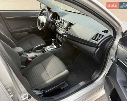 Сірий Міцубісі Lancer, об'ємом двигуна 1.6 л та пробігом 205 тис. км за 7900 $, фото 11 на Automoto.ua