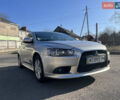 Сірий Міцубісі Lancer, об'ємом двигуна 1.59 л та пробігом 89 тис. км за 7500 $, фото 1 на Automoto.ua