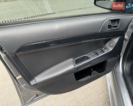 Сірий Міцубісі Lancer, об'ємом двигуна 1.6 л та пробігом 65 тис. км за 9500 $, фото 4 на Automoto.ua