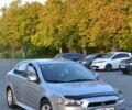 Серый Мицубиси Лансер, объемом двигателя 2 л и пробегом 229 тыс. км за 8500 $, фото 1 на Automoto.ua