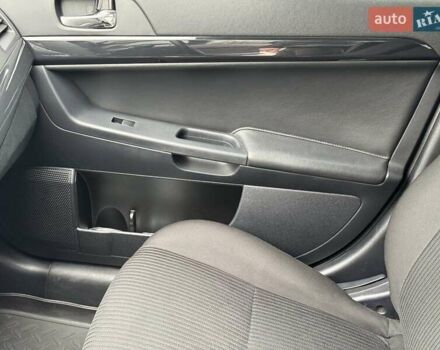 Сірий Міцубісі Lancer, об'ємом двигуна 1.6 л та пробігом 65 тис. км за 9500 $, фото 10 на Automoto.ua
