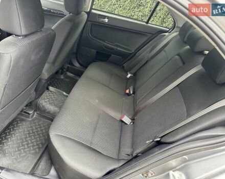 Сірий Міцубісі Lancer, об'ємом двигуна 1.6 л та пробігом 65 тис. км за 9500 $, фото 12 на Automoto.ua