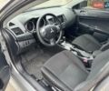 Сірий Міцубісі Lancer, об'ємом двигуна 1.6 л та пробігом 65 тис. км за 9500 $, фото 8 на Automoto.ua