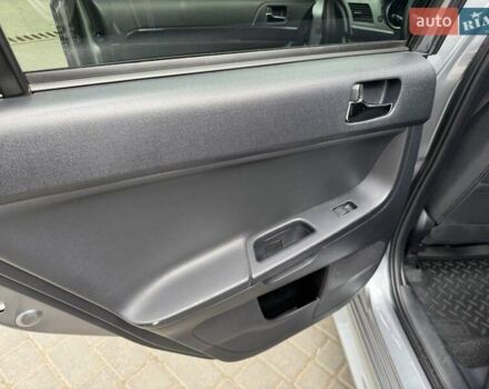 Сірий Міцубісі Lancer, об'ємом двигуна 1.6 л та пробігом 65 тис. км за 9500 $, фото 9 на Automoto.ua