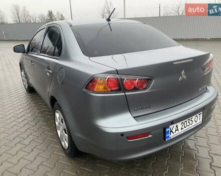 Серый Мицубиси Лансер, объемом двигателя 1.59 л и пробегом 83 тыс. км за 9900 $, фото 13 на Automoto.ua