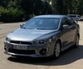 Серый Мицубиси Лансер, объемом двигателя 2 л и пробегом 96 тыс. км за 8999 $, фото 1 на Automoto.ua