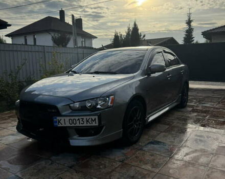 Серый Мицубиси Лансер, объемом двигателя 2 л и пробегом 95 тыс. км за 8300 $, фото 3 на Automoto.ua