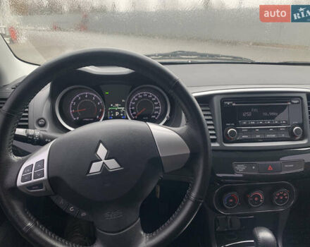 Серый Мицубиси Лансер, объемом двигателя 1.59 л и пробегом 83 тыс. км за 9900 $, фото 35 на Automoto.ua