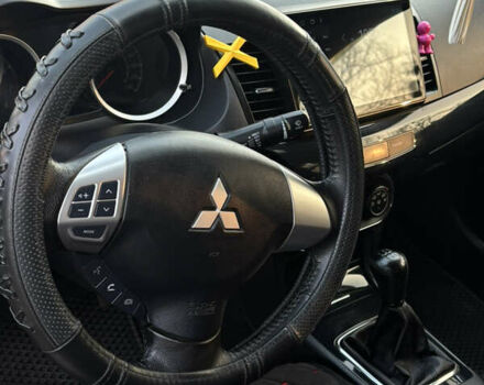 Серый Мицубиси Лансер, объемом двигателя 1.59 л и пробегом 78 тыс. км за 12000 $, фото 5 на Automoto.ua