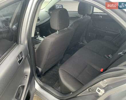 Серый Мицубиси Лансер, объемом двигателя 1.59 л и пробегом 83 тыс. км за 9900 $, фото 30 на Automoto.ua