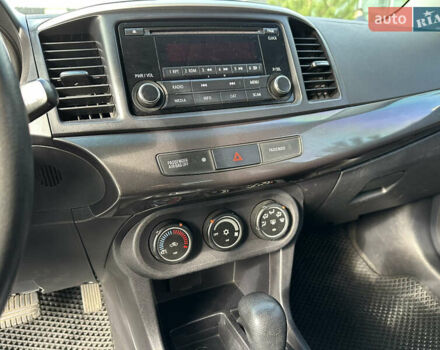 Серый Мицубиси Лансер, объемом двигателя 2 л и пробегом 189 тыс. км за 7900 $, фото 12 на Automoto.ua