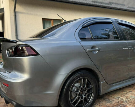 Серый Мицубиси Лансер, объемом двигателя 2 л и пробегом 95 тыс. км за 8300 $, фото 13 на Automoto.ua