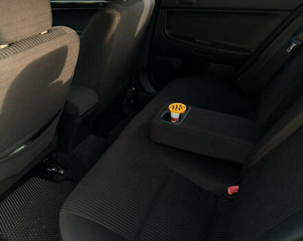 Серый Мицубиси Лансер, объемом двигателя 2 л и пробегом 95 тыс. км за 8300 $, фото 24 на Automoto.ua