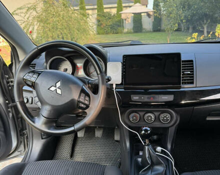 Серый Мицубиси Лансер, объемом двигателя 2 л и пробегом 95 тыс. км за 8300 $, фото 23 на Automoto.ua