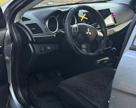 Серый Мицубиси Лансер, объемом двигателя 1.59 л и пробегом 78 тыс. км за 12000 $, фото 3 на Automoto.ua