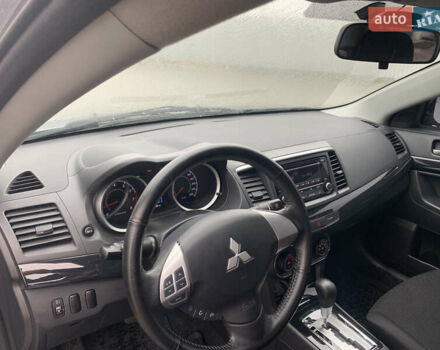 Серый Мицубиси Лансер, объемом двигателя 1.59 л и пробегом 83 тыс. км за 9900 $, фото 34 на Automoto.ua