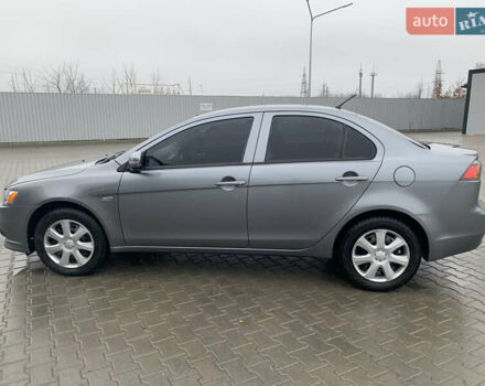 Серый Мицубиси Лансер, объемом двигателя 1.59 л и пробегом 83 тыс. км за 9900 $, фото 18 на Automoto.ua