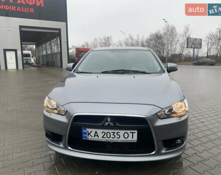 Серый Мицубиси Лансер, объемом двигателя 1.59 л и пробегом 83 тыс. км за 9900 $, фото 5 на Automoto.ua