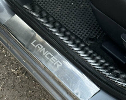 Серый Мицубиси Лансер, объемом двигателя 1.59 л и пробегом 78 тыс. км за 12000 $, фото 2 на Automoto.ua