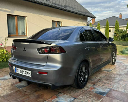 Серый Мицубиси Лансер, объемом двигателя 2 л и пробегом 95 тыс. км за 8300 $, фото 16 на Automoto.ua
