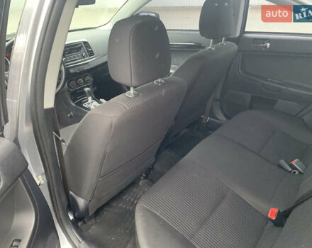 Серый Мицубиси Лансер, объемом двигателя 1.59 л и пробегом 83 тыс. км за 9900 $, фото 29 на Automoto.ua