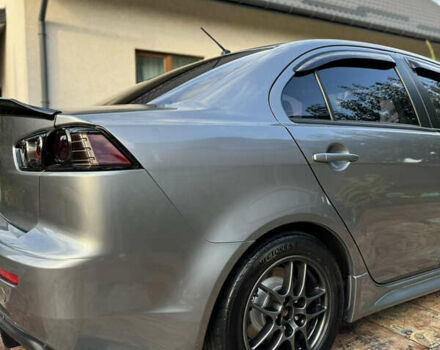 Серый Мицубиси Лансер, объемом двигателя 2 л и пробегом 95 тыс. км за 8300 $, фото 12 на Automoto.ua