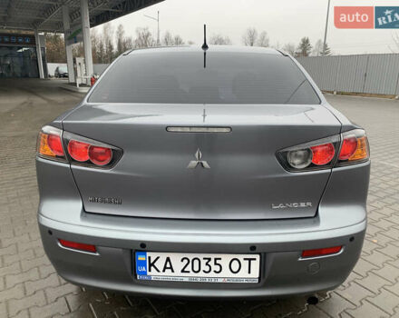 Серый Мицубиси Лансер, объемом двигателя 1.59 л и пробегом 83 тыс. км за 9900 $, фото 12 на Automoto.ua