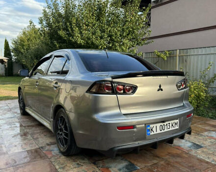 Серый Мицубиси Лансер, объемом двигателя 2 л и пробегом 95 тыс. км за 8300 $, фото 18 на Automoto.ua