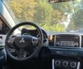 Серый Мицубиси Лансер, объемом двигателя 2 л и пробегом 96 тыс. км за 8999 $, фото 15 на Automoto.ua