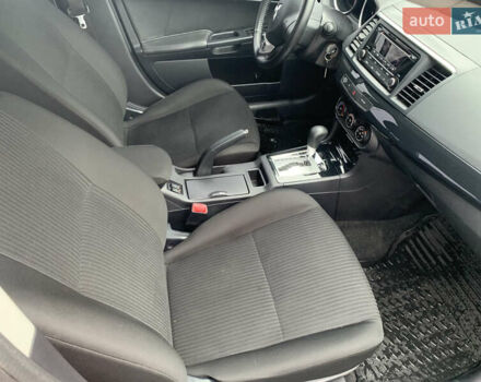 Серый Мицубиси Лансер, объемом двигателя 1.59 л и пробегом 83 тыс. км за 9900 $, фото 4 на Automoto.ua