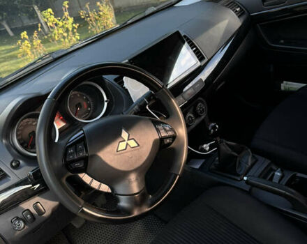 Серый Мицубиси Лансер, объемом двигателя 2 л и пробегом 95 тыс. км за 8300 $, фото 22 на Automoto.ua