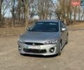 Серый Мицубиси Лансер, объемом двигателя 2 л и пробегом 149 тыс. км за 9299 $, фото 1 на Automoto.ua