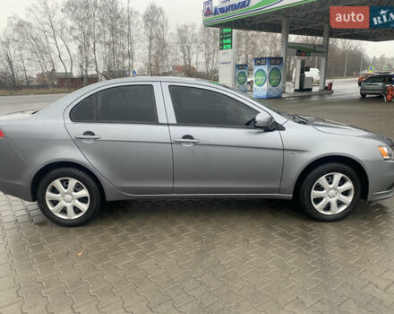 Серый Мицубиси Лансер, объемом двигателя 1.59 л и пробегом 83 тыс. км за 9900 $, фото 8 на Automoto.ua