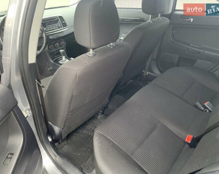 Серый Мицубиси Лансер, объемом двигателя 1.59 л и пробегом 83 тыс. км за 9900 $, фото 32 на Automoto.ua