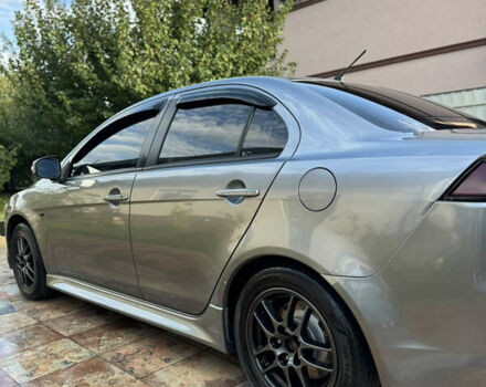 Серый Мицубиси Лансер, объемом двигателя 2 л и пробегом 95 тыс. км за 8300 $, фото 14 на Automoto.ua