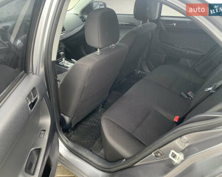 Серый Мицубиси Лансер, объемом двигателя 1.59 л и пробегом 83 тыс. км за 9900 $, фото 28 на Automoto.ua