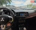 Серый Мицубиси Лансер, объемом двигателя 2 л и пробегом 164 тыс. км за 18000 $, фото 5 на Automoto.ua