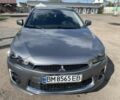 Сірий Міцубісі Lancer, об'ємом двигуна 2 л та пробігом 112 тис. км за 9700 $, фото 1 на Automoto.ua