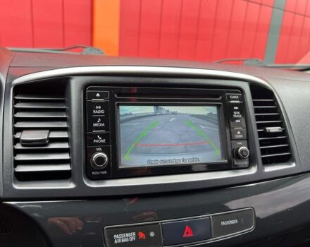 Серый Мицубиси Лансер, объемом двигателя 2 л и пробегом 170 тыс. км за 9500 $, фото 12 на Automoto.ua